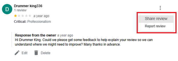 A Google review and the menu to report it.