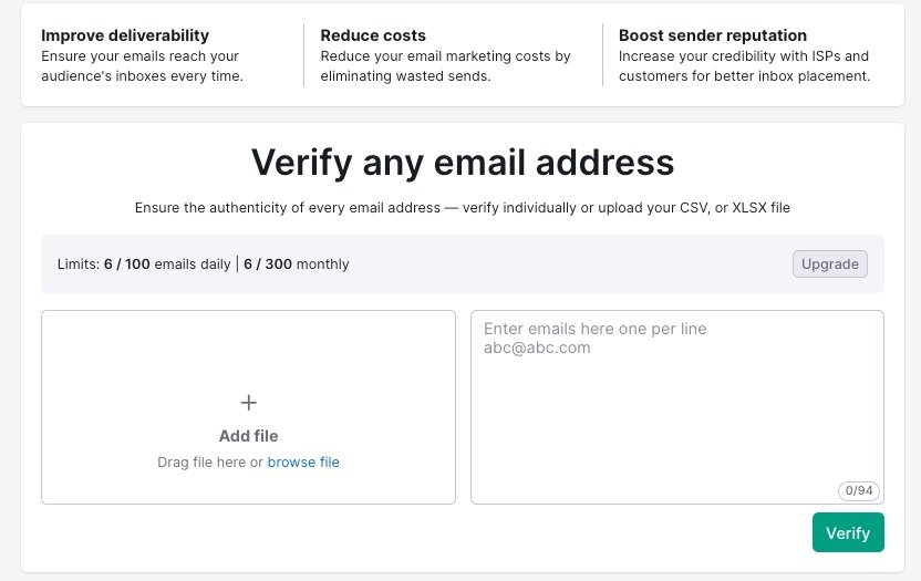 The user interface has two boxes for uploading a file or entering email addresses line by line. There is a green &ldquo;Verify&rdquo; button at the bottom of the page. 